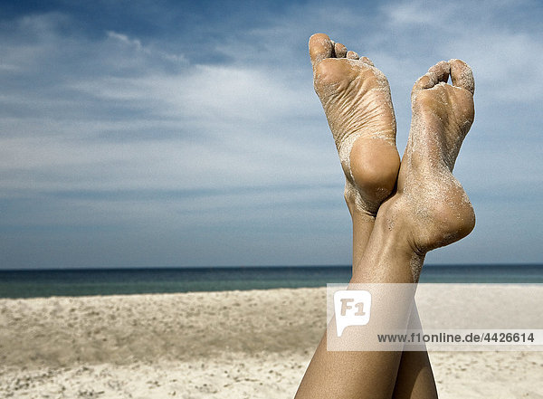 Sole of foot of a woman at beach