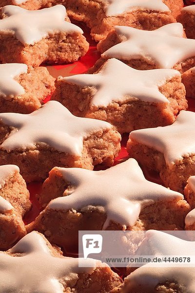 Close up of star-shaped cinnamon cookies