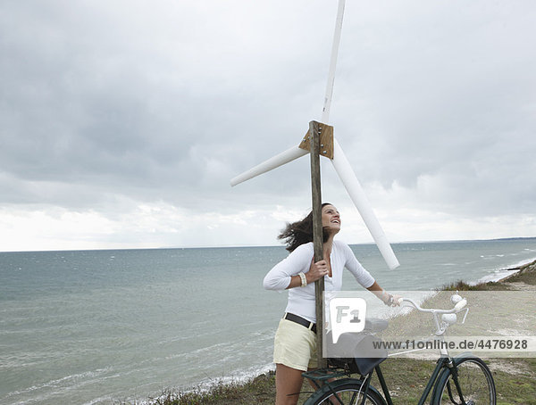 Woman with wind turbine