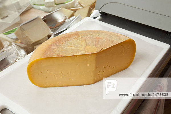 A cheddar cheese wheel