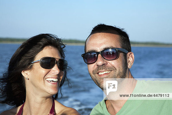 Portrait of a couple enjoying summer  outdoors