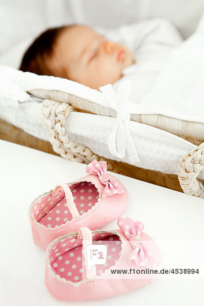 Baby girl shoes and baby sleeping