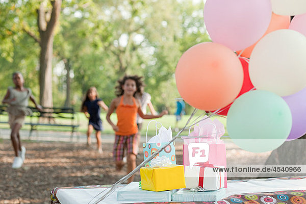 Outdoor birthday party with balloons