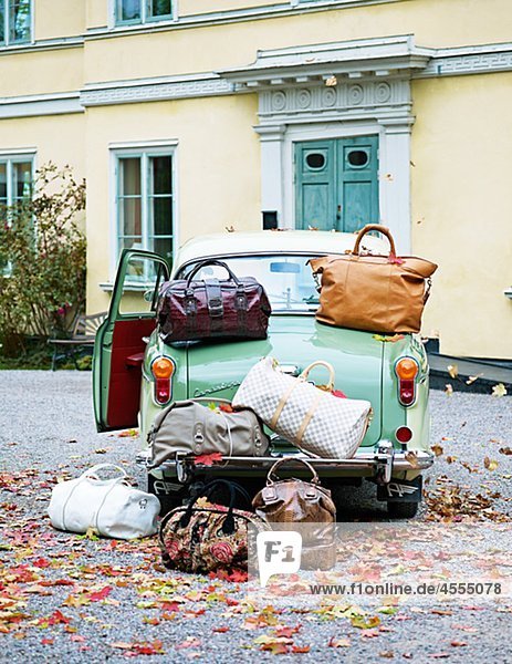 Vintage car with lots of luggage