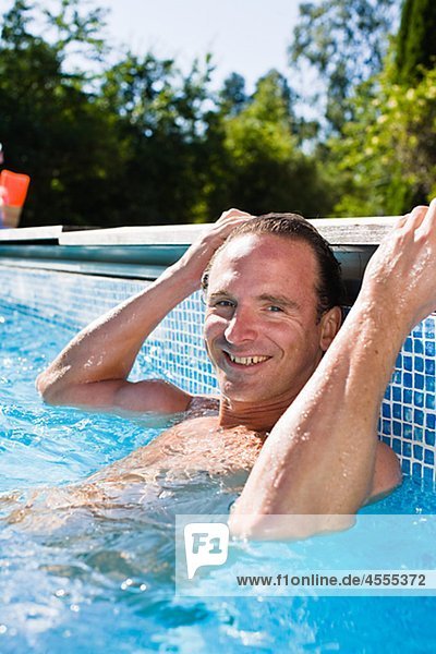 Portrait of mature man in swimming pool