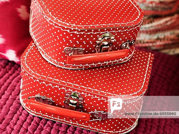 Small red suitcases