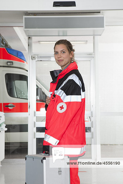 Paramedic girl in hall  smiling