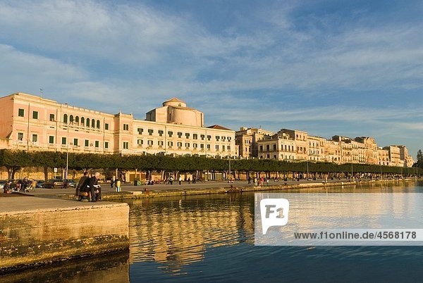 View of Ortygia Island seafront bathed in evening sunlight  Siracusa  Sicily  Italy
