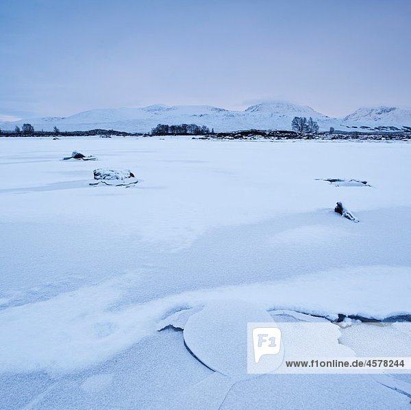 Frozen Loch Ba in winter  Rannoch Moor  Highland  Scotland