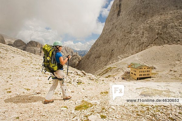 Italy  Dolomites  Mature woman hiking at Rosengarten mountains