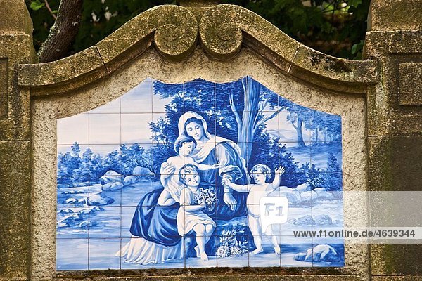 Azulejos typical earthenware tiles  on an outside wall  Porto  Portugal