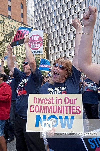 Detroit  Michigan - Members of the United Auto Workers march through the Detroit banking district at the conclusion of their constitutional convention to protest what they called the evils of Wall Street: corporate greed  home foreclosures  jobs sent over