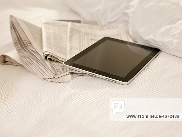 Tablet PC and newspaper