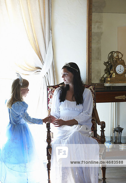 Mother & daughter dressed as princesses