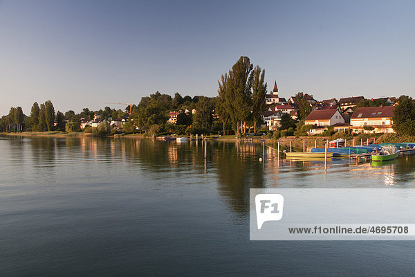 Dingelsdorf on Lake Constance  with parish church of St. Nicholas in the morning light  Dingelsdorf  Baden-Wuerttemberg  Germany  Europe