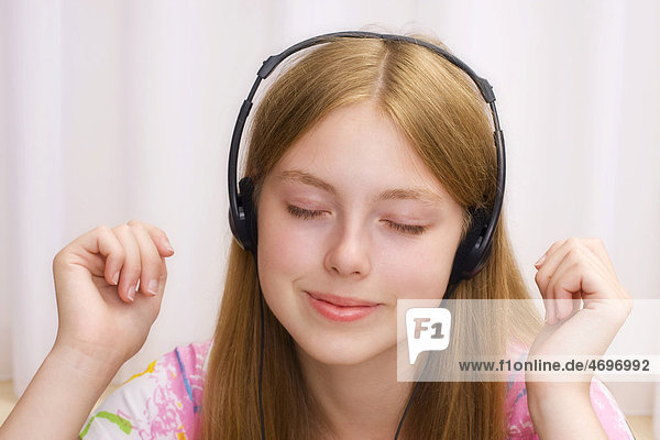 Girl  17 years  with headphones