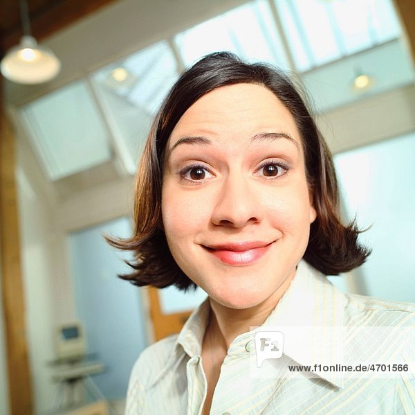 Portrait of a friendly young woman