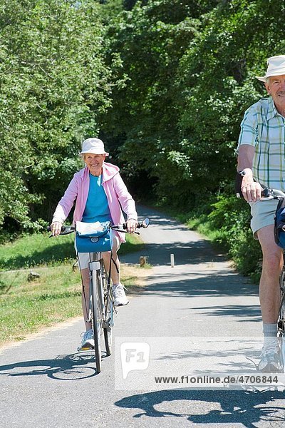 Couple riding their bicycles Washington State USA