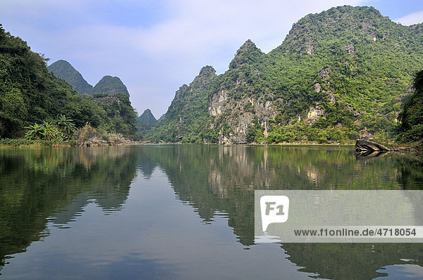 Near Ninh Binh  on the way along the river to the caves of Trung Anh  dry Halong Bay  Vietnam  Southeast Asia