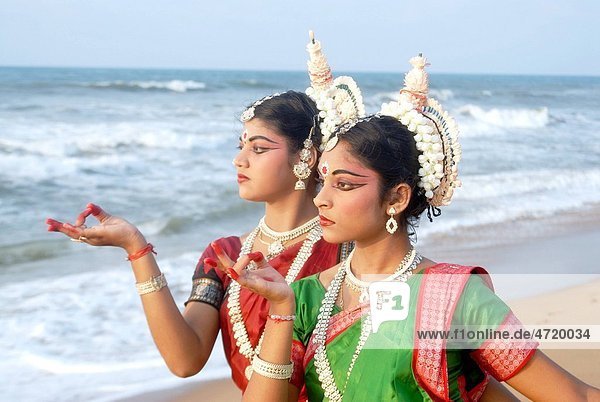 Dancers performing classical traditional odissi dance , Konarak , Orissa , India MR 736D, 736C