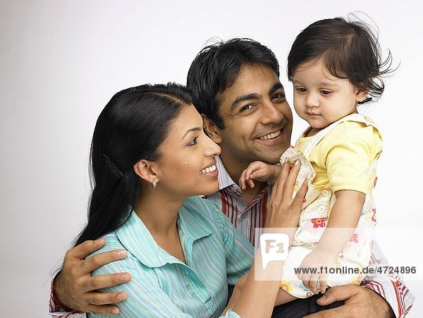 Indian parent with baby girl MR702O 702A 702L
