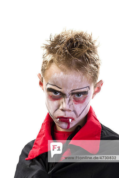 Boy 7 years old dressed up and made-up as a vampire