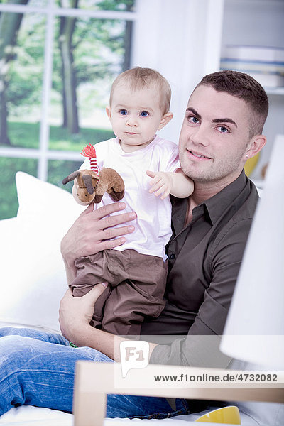 Young man with baby