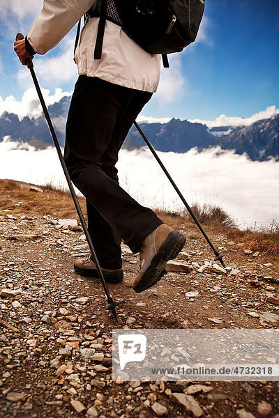 Woman hiking in Drei Zinnen  Tre Cime di Lavaredo area in Dolomite Alps  Southtirol  Italy  Europe