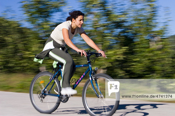 Cyclist  woman riding a bike