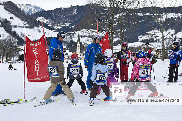 Children attending a ski course for beginners with their ski instructor  Niederau  Austria  Europe