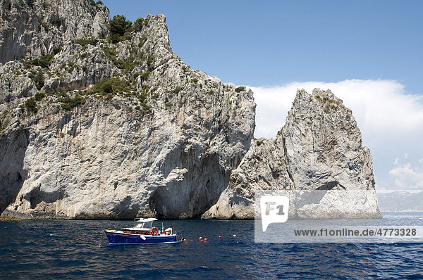 Boat on the east coast of the island of Capri  Italy  Europe