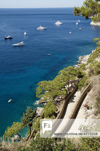 View over Via Krupp with boats in the bay in front of Marina Piccola  island of Capri  Italy  Europe