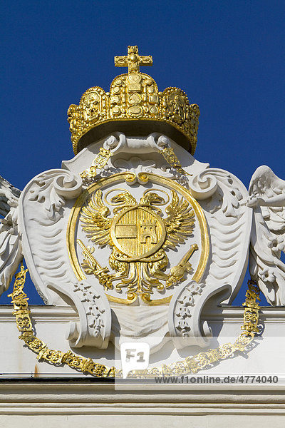 Imperial crown and coat of arms on the roof of the Hofburg Imperial Palace  Vienna  Austria  Europe