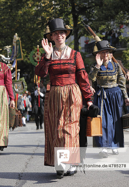 Woman in Beurer Gwand costume  Trachtengruppe Edelweiss Neubeuern local costume group in Upper Bavaria  Costume and Riflemen's Procession for the Oktoberfest  Munich  Upper Bavaria  Bavaria  Germany  Europe