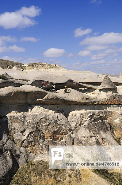 Mountain bikers at Cavusim  Goreme Valley  Cappadocia  Turkey  Western Asia