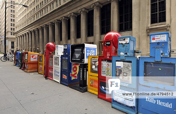 Colourful newspaper boxes on the roadside  Chicago  Illinois  United States of America  USA