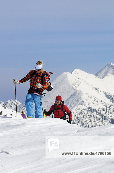 Skiers on tour on Mt. Duerrnbachhorn  Reit im Winkl  Chiemgau  Upper Bavaria  Germany  Europe