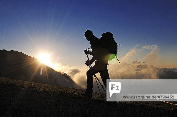 Sunrise  mountain climber on Corno Grande  Campo Imperatore  Gran Sasso National Park  Abruzzo  Italy  Europe