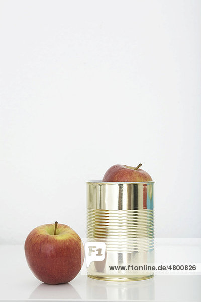 Fresh apples in a tin can  preserved food