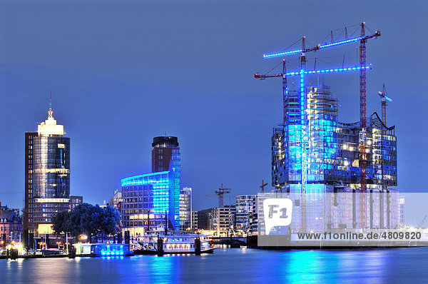 Elbphilharmonie philharmonic hall  Hanseatic Trade Center and Blue Port illumination in the port of Hamburg  Germany  Europe