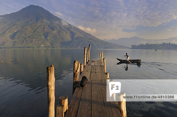 Dock  boat  Lake Atitlan  San Pedro volcano  fisherman  Guatemala  Central America