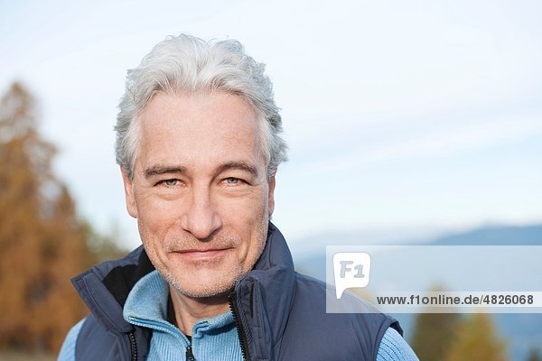 Italy  South Tyrol  Mature man hiking at dolomites  portrait