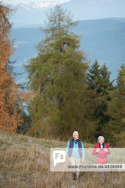 Italy  South Tyrol  Mature couple hiking on dolomites