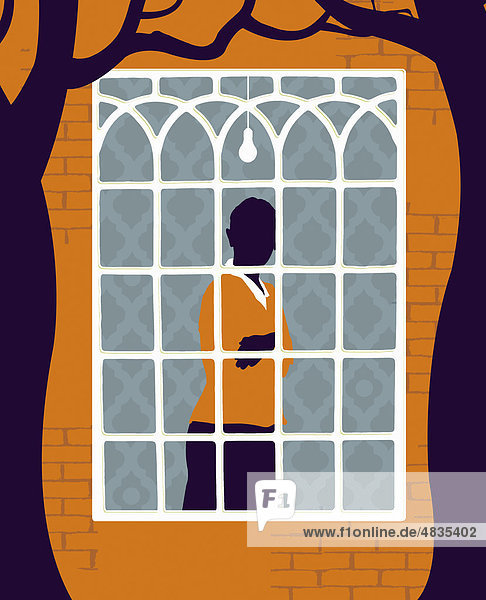 Woman with arms crossed looking out window