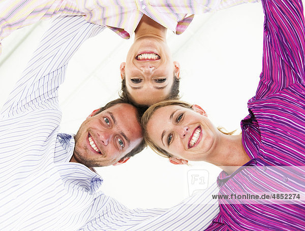 Three happy business people