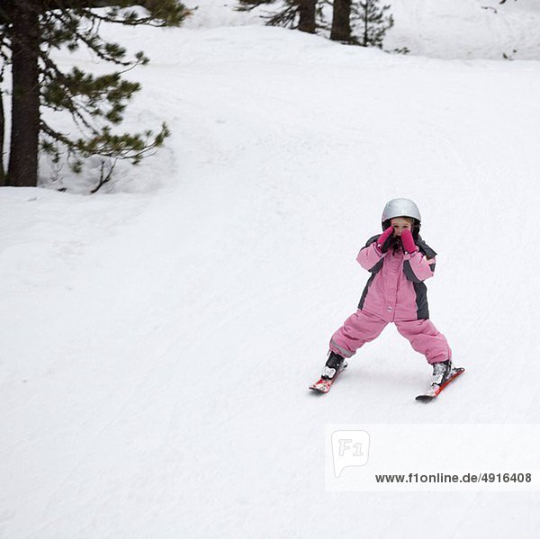 little girl skiing