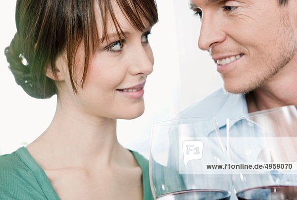 Man and woman drinking wine