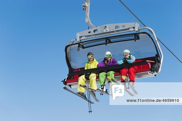 Italy  Trentino-Alto Adige  Alto Adige  Bolzano  Seiser Alm  Group of skiers using ski lift