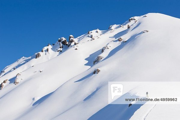 Italy  Trentino-Alto Adige  Alto Adige  Bolzano  Seiser Alm  Mid adult man skiing on mountain