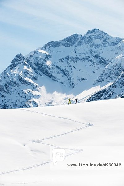 Austria  Kleinwalsertal  Couple skiing